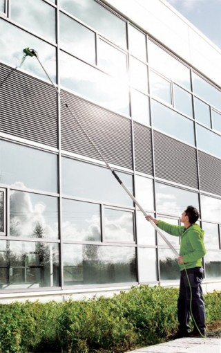Image of Pure Water pole-fed window cleaning systems in action