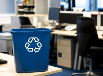 Image of a recycling bin being used as part of Fusion's commercial cleaning services